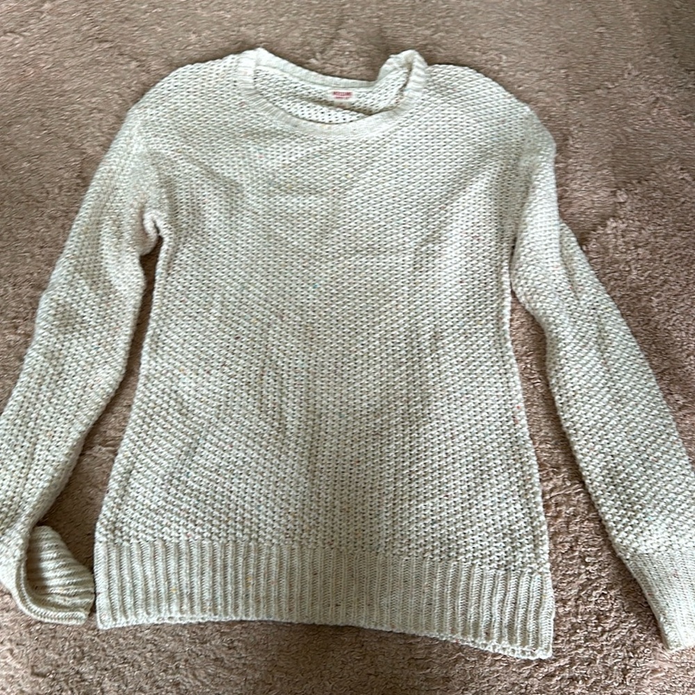 Cream color sweater with multicolored knits